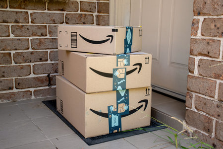 Sydney, Australia - 2020-11-29 Amazon prime boxes delivered to a front door of residential building Online shopping and deliveryのeditorial素材