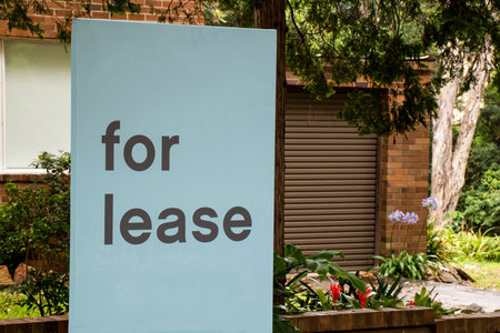 For lease sign on a blue display outside of a resedential building in Australiaの写真素材
