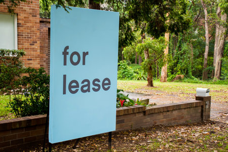For lease sign on a blue display outside of a resedential building in Australiaの写真素材