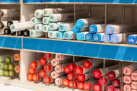 Sydney, Australia 2020-12-12 Alcohol-based Copic sketch markers on display in a shelf at stationery art supplies shop. Selective focus with blur.のeditorial素材