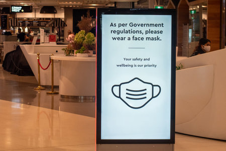 Sydney, Australia - 2020-01-14 Wearing face masks in shopping centres are compulsory in some australian states. As per Government regulations, please wear a face maskのeditorial素材