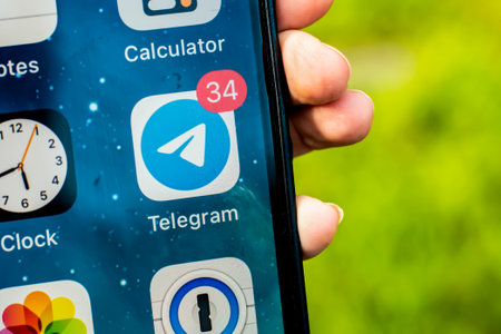 Sydney, Australia - 2021-01-17 Telegram messenger social networking app on the phone screen.のeditorial素材