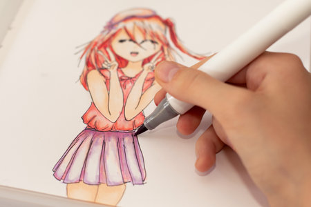 Hand drawing a cute girl anime style sketch with alcohol based sketch drawing markers.の写真素材