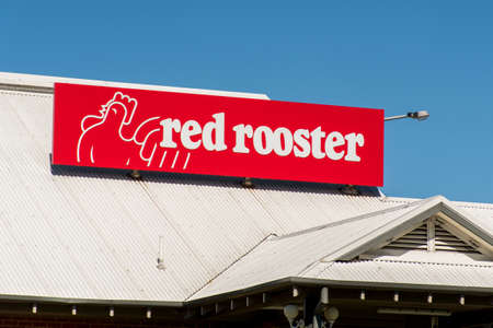 Lithgow, Australia 2021-04-03 Red Rooster franchise fast food restaurant logo sign.のeditorial素材