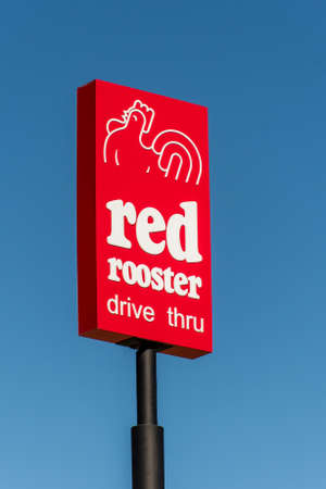 Lithgow, Australia 2021-04-03 Red Rooster franchise fast food restaurant drive thru logo sign.のeditorial素材