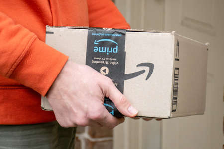 Sydney, Australia - 2020-05-24 Amazon prime boxdelivered to a front door of residential building.のeditorial素材