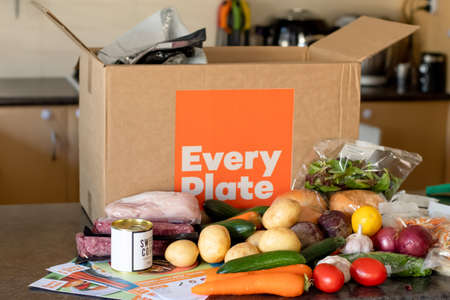 Sydney, Australia 2021-07-17 Every plate meal kit in a cardboard box on a kitchen counter. EveryPlate is actually owned by HelloFresh and was launched in 2018 as a lower-cost alternative.のeditorial素材
