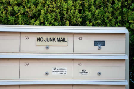 No Junk mail sign on letter boxes . Direct mailers opt out. How to stop junk mail catalogs catalogueの写真素材