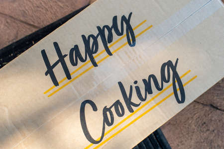 Meal kit cardboard box delivered. Subscription service delivery cooking ingridients to your door....