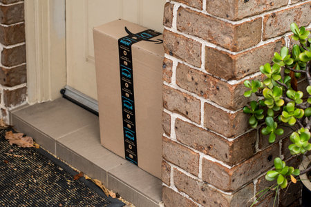Sydney, Australia - 2021-10-30 Amazon prime box delivered to a front door of residential building. Black Friday Cyber Monday Christmas Sale Prime Dayのeditorial素材