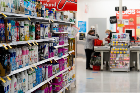 Sydney, Australia 2021-10-01 Washing aisle at Coles supermarket during COVID-19 outbreak. Coles stuff member and customer at checkout.のeditorial素材