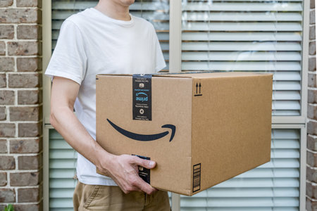 Sydney, Australia - 2022-03-12 Amazon prime big huge box delivered to a front door of residential buildingのeditorial素材