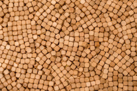 Hinoki cypress mini small wooden cubes chips for indoor sandpits sensory play playground. Wooden cubes backgroundの写真素材