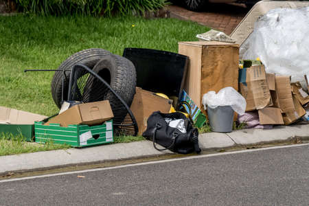 Household miscellaneous rubbish items put on the street for council bulk waste collection.の写真素材