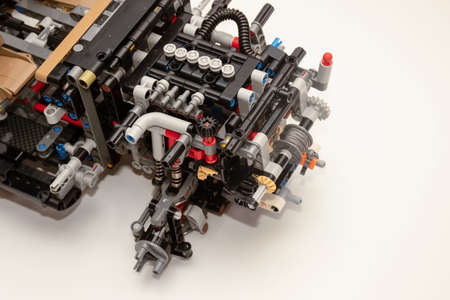 piece of a complex machinery car engine made from plastic construction kit parts pieces detailsの写真素材