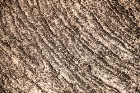 Sandstone surface rough eroded rock cliff textured natural backgroundの写真素材