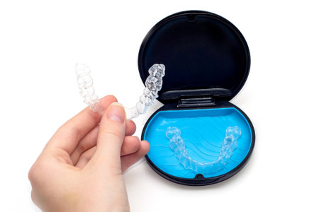 Transparent aligners and storage case box. invisible braces. Clear teeth straighteners. plastic bracersの写真素材