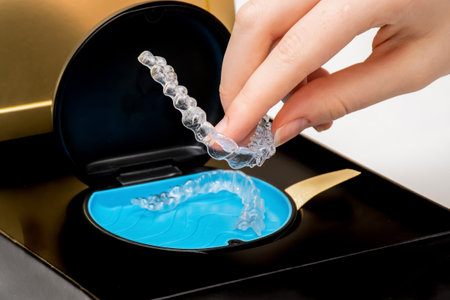 Transparent aligners in a box. invisible braces. Clear teeth straighteners. clear plastic bracersの写真素材