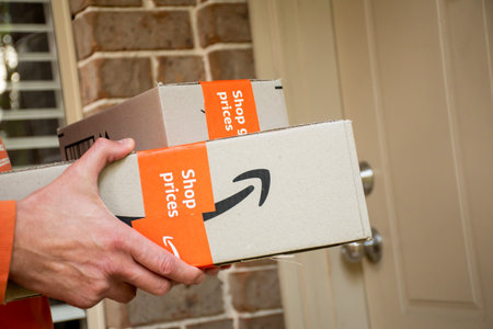 Sydney, Australia - 2022-11-29 Amazon prime boxes delivered to a front door of residential building. online shoppingのeditorial素材