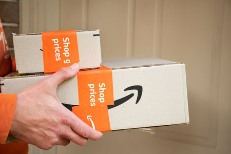 Sydney, Australia - 2022-11-29 Amazon prime boxes delivered to a front door of residential building. online shoppingのeditorial素材