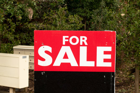For sale sign on black board near the residential building. Property Real estate bying selling investment conceptの写真素材