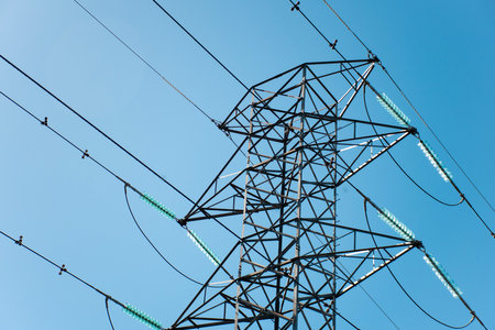 High voltage transmission network lines in Australia . Double Circuit Steel field transmission tower. Overhead transmission line conductorsの写真素材