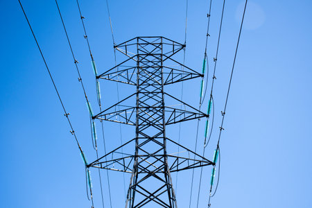 High voltage transmission network lines in Australia . Double Circuit Steel field transmission tower. Overhead transmission line conductorsの写真素材
