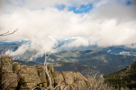 Mount Buffalo National Park, Victoria. Australia. Australian Alps views from the Horn picnic area. Mountains and clouds scenic viewlandscapeの写真素材