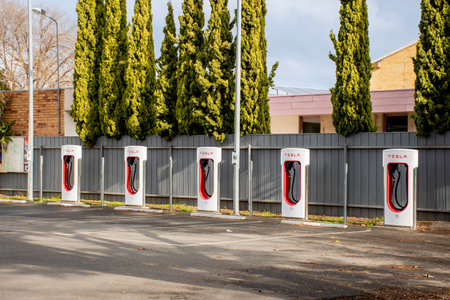 Euroa, Australia - 2023-07-08 Tesla Superchargers electric car vehicle charger station. Environment friendly innovative feature.のeditorial素材