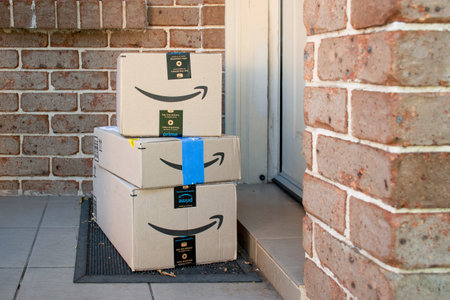 Sydney, Australia - 2023-07-12 Amazon prime boxes and envelopes delivered to a front door of residential building. Black Friday Cyber Monday Christmas Sale Prime Day. Amazon Flex deliveryのeditorial素材