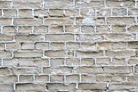 Old brick wall. Ancient stone texture background. Urban background, white ruined industrial brick wall with copy spaceの写真素材