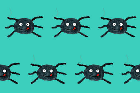 Halloween seamless pattern with funny cartoon spider. Endless texture for wallpaper, web page background, wrapping paper. Flat style. Black smiling spider with tongue on blue boardの写真素材