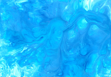 Abstract fluid art background. Blue, purple and white colors mix together. Beautiful creative print. Abstract art hand paint. Original artwork. Color splashing on paper. Interior pictureの写真素材
