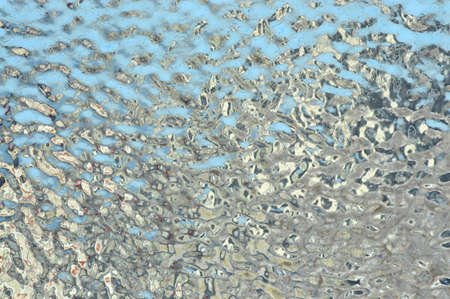 Abstract photo background. Iced window glass. Ice texture. Frozen icy texture, macro view, soft focus. Frost and very cold winter day.の写真素材