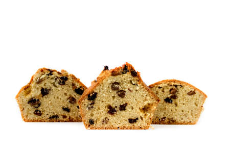 Slices of cake with raisins isolated on white background.の写真素材