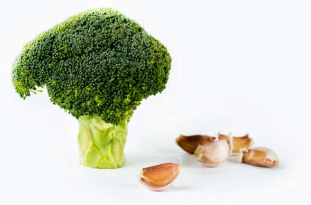 Broccoli in a pile isolated on white background.の写真素材