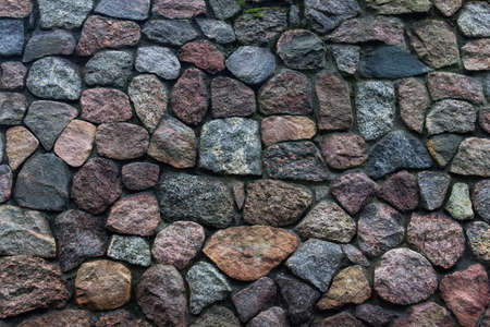 Ancient stone pattern made of separate big stones. Decorative, architectural element.の写真素材