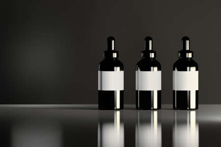 Three shiny black cosmetic bottles with white labels standing on the reflective shiny surface. Beauty products package design. 3d illustration.の写真素材