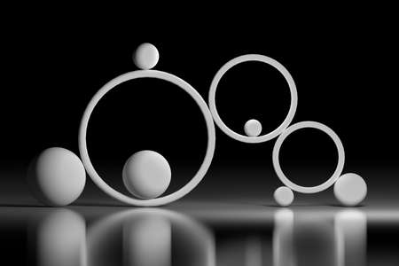 Abstract illustration of balance concept - composition with rings and balls in black and white colors over shiny reflective surface. 3d illustration.の写真素材