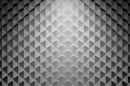 Top view of the shaded surface with pyramids, repeating triangular geometric shapes. 3d...