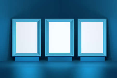 Three picture frames for presentation mockups with blank copy space standing on pedestal in blue...