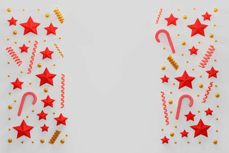 Simple abstract Christmas New year composition with red, golden spirals, stars, candy canes and...