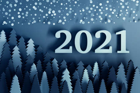 New year 2021 greeting card with numbers and schematic forest and falling snow in dark classic blue...