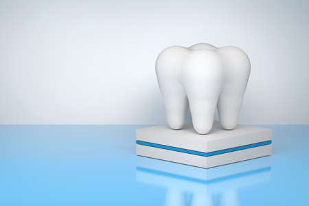 Medical dental composition with white root tooth on a pedestal on blue reflective background. Image with copy blank space. 3d illustration.の写真素材