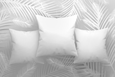 Mockup template with three pillows with blank surfces and feathers. 3d render.の写真素材
