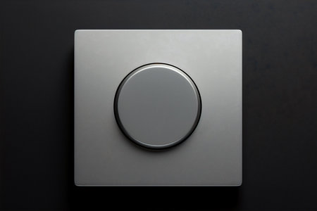 A distinct square button in matte gray, prominently displayed on a gray background, Generative AIの素材