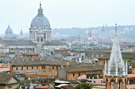 Rome View on architecture. One can see the roofs and domes of cathedrals.の写真素材