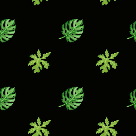Green tropical leaves on a black background create a stylish pattern for home decor and fashion designsの写真素材