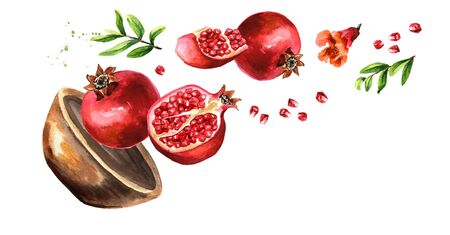Bowl with Flying fresh ripe whole and cut pomegranate with seeds, flower and leaves.の写真素材