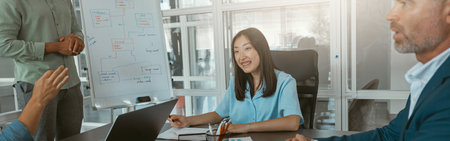 Group of multiethnic business people working together on project while sitting in meeting room